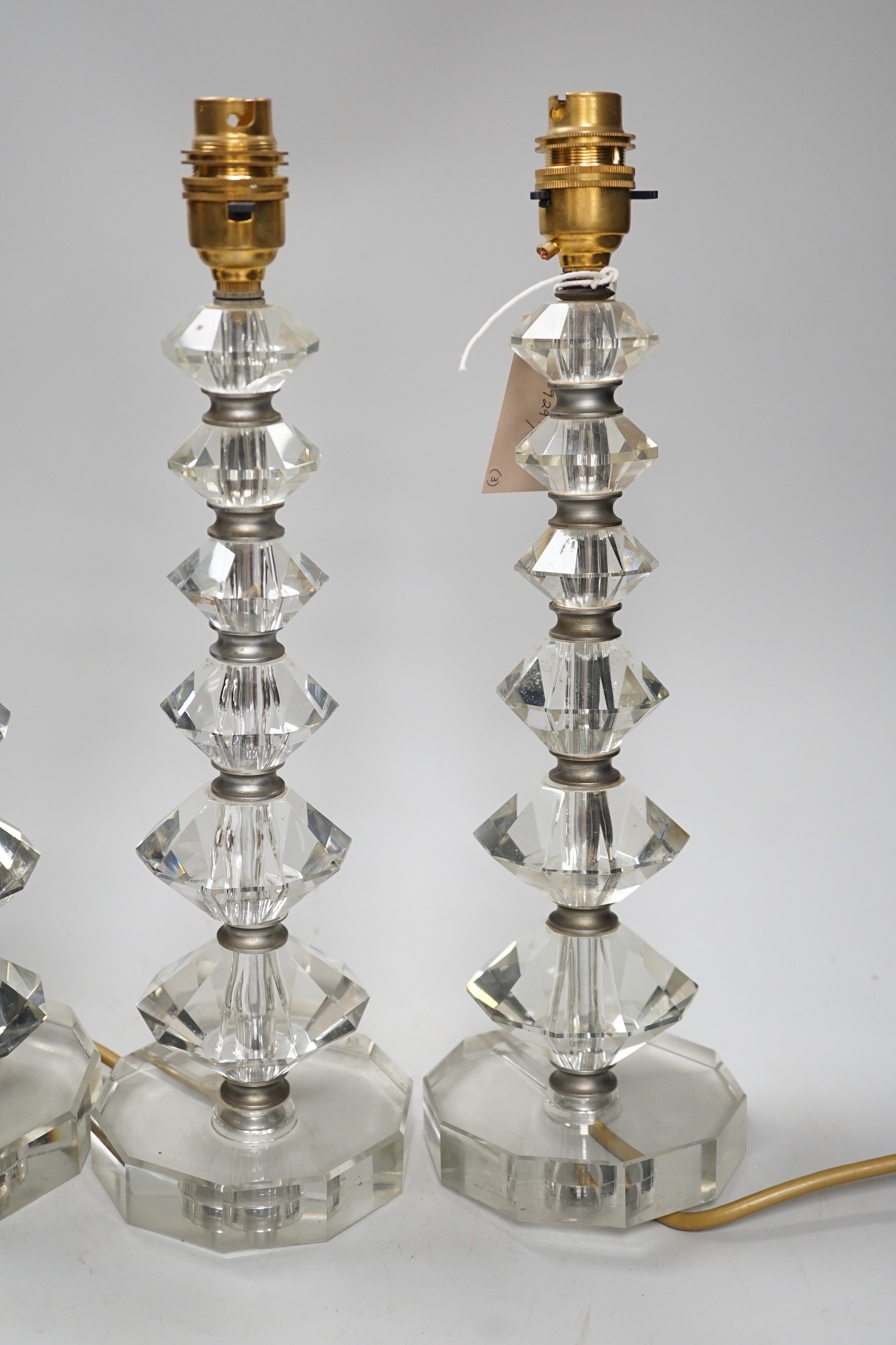 A set of three Art Deco cut glass table lamps 37cm total height